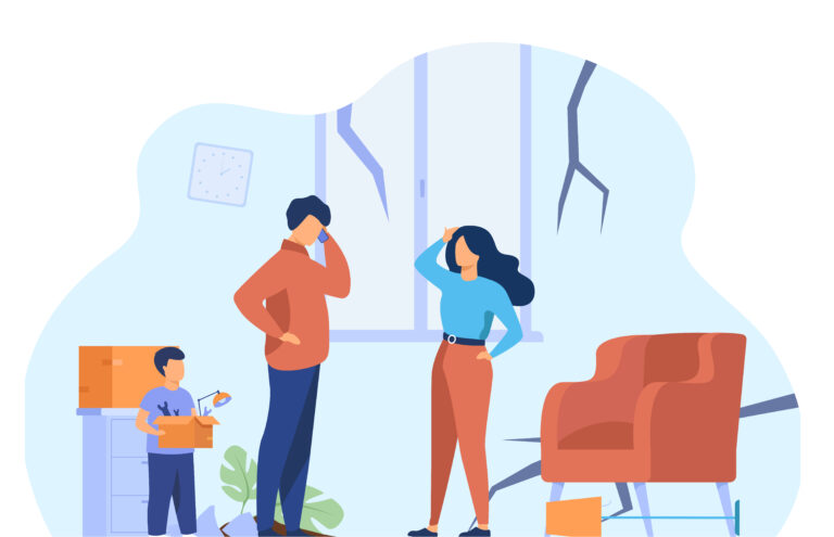 A family assesses earthquake damage to their home.